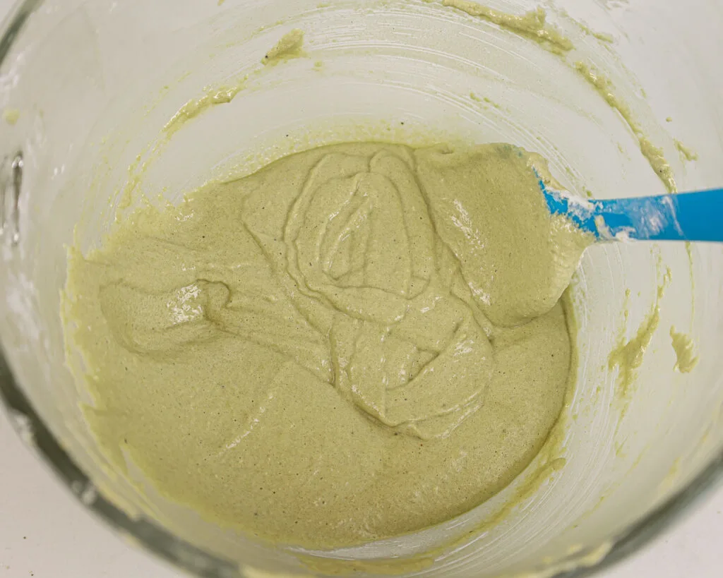 image of macaron batter that's been mixed perfectly and has passed the figure 8 test