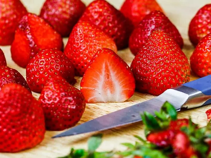 image of strawberries cut and ready to be made into strawberry jam