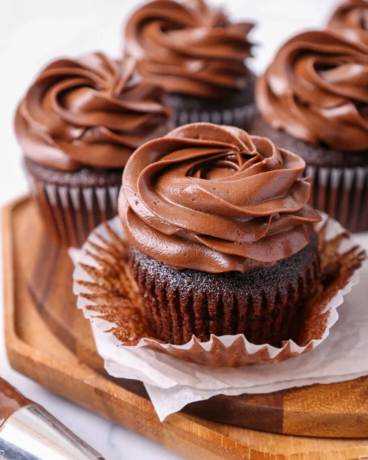 image of moist chocolate cupcakes that have been frosted with a decadent dark chocolate buttercream