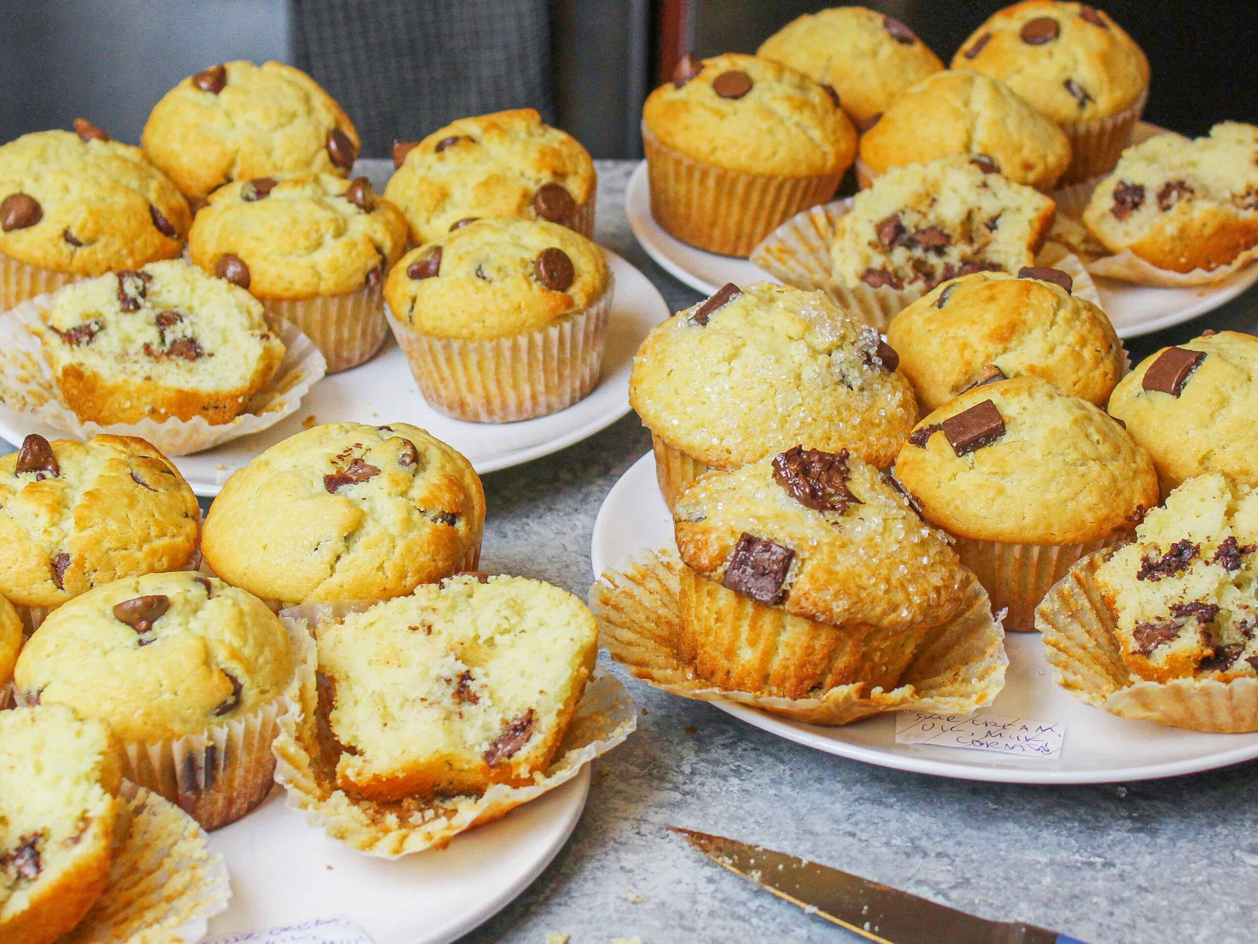 photo of several batches of chocolate chip muffins made by chelsweets during recipe testing