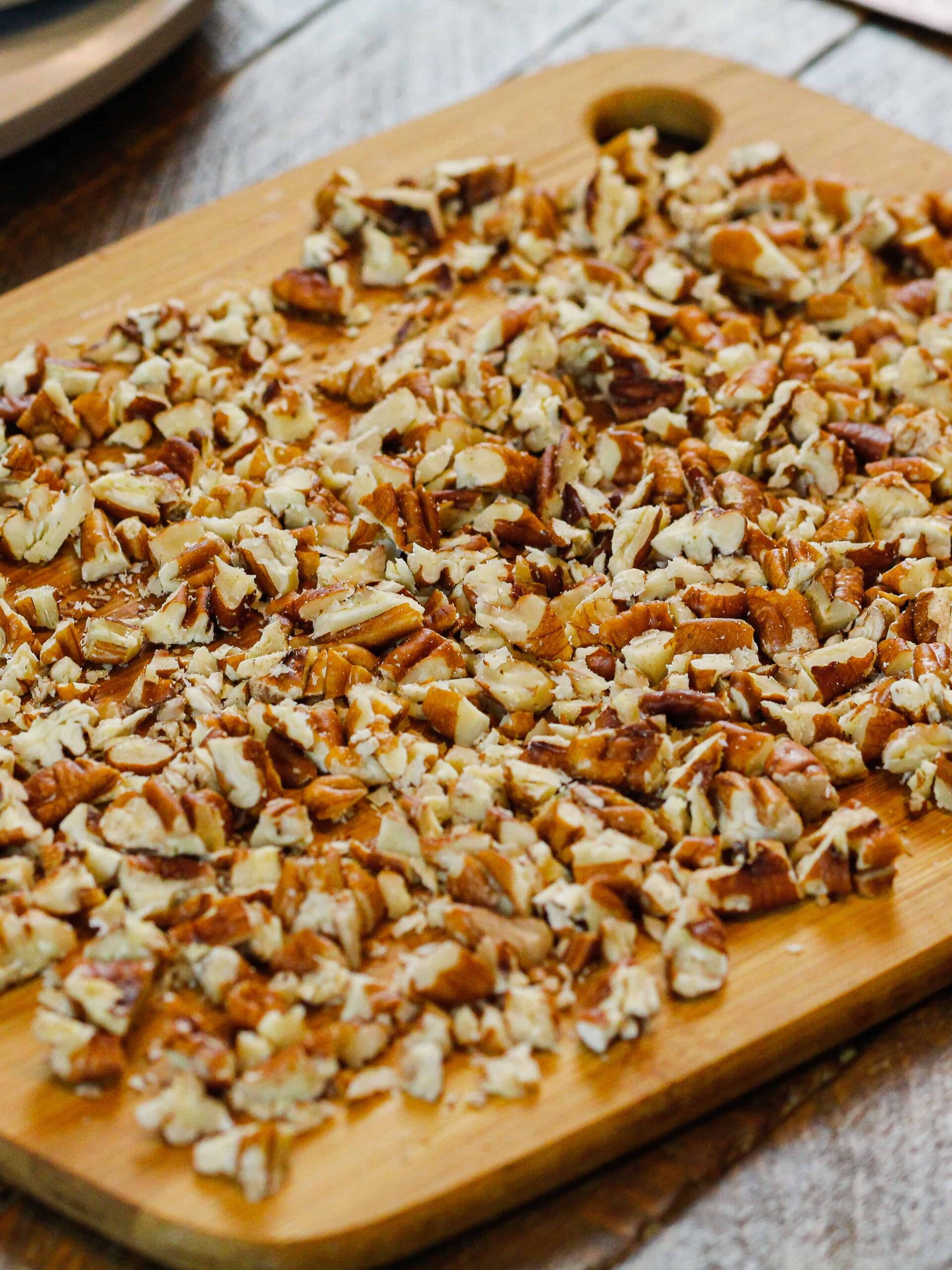 image of chopped pecans ready to be put into a german chocolate cupcake filling