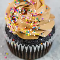 image of a chocolate cupcake frosted with delicious chocolate Italian meringue buttercream