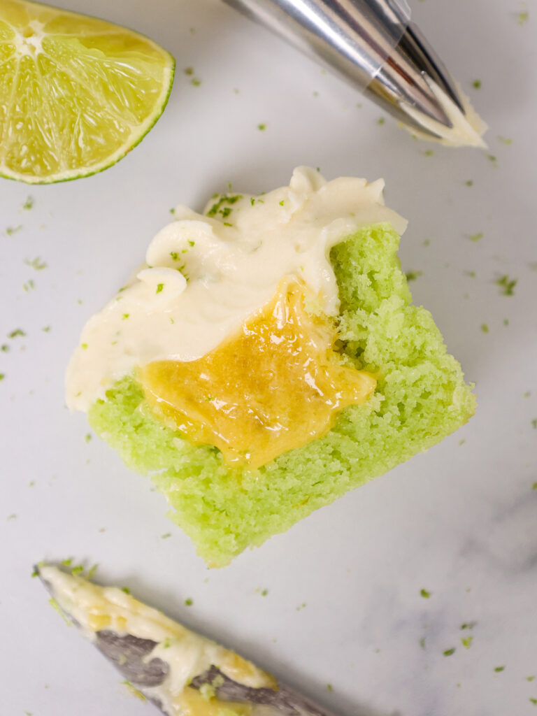 image of a lime cupcake that's been cut in half to show it's lime curd filling