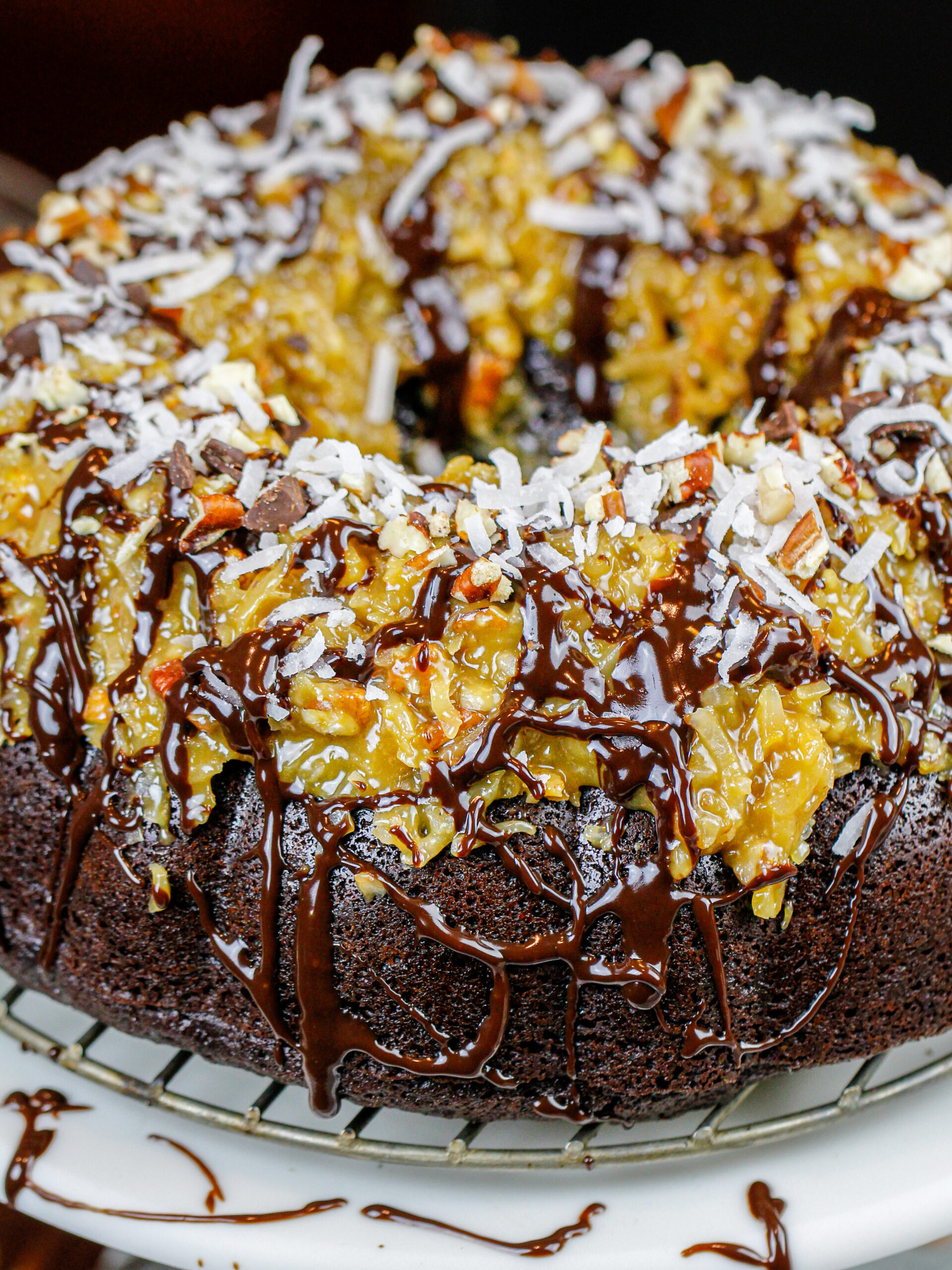 image of a german chocolate bundt cake drizzled with chocolate ganache
