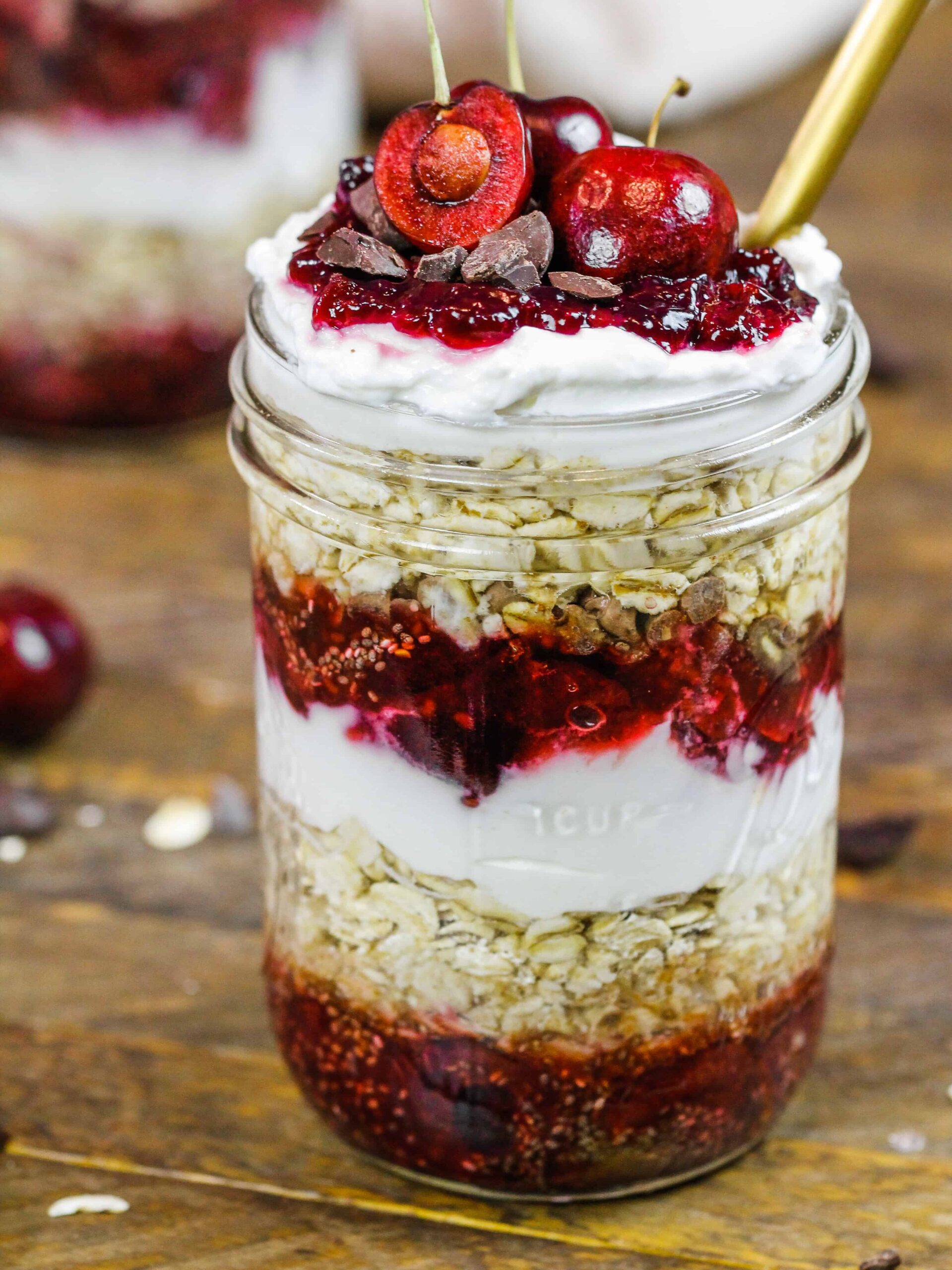 image of cherry overnight oats in a cute mason jar