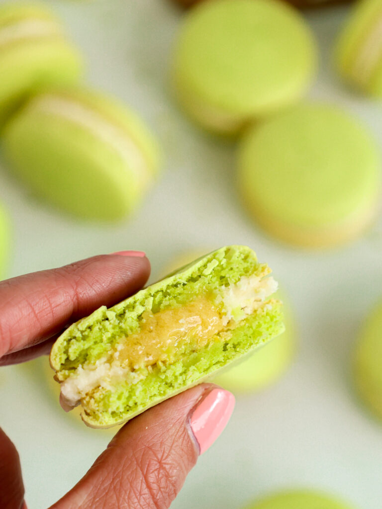 image of a macaron that's been filled with homemade lime curd