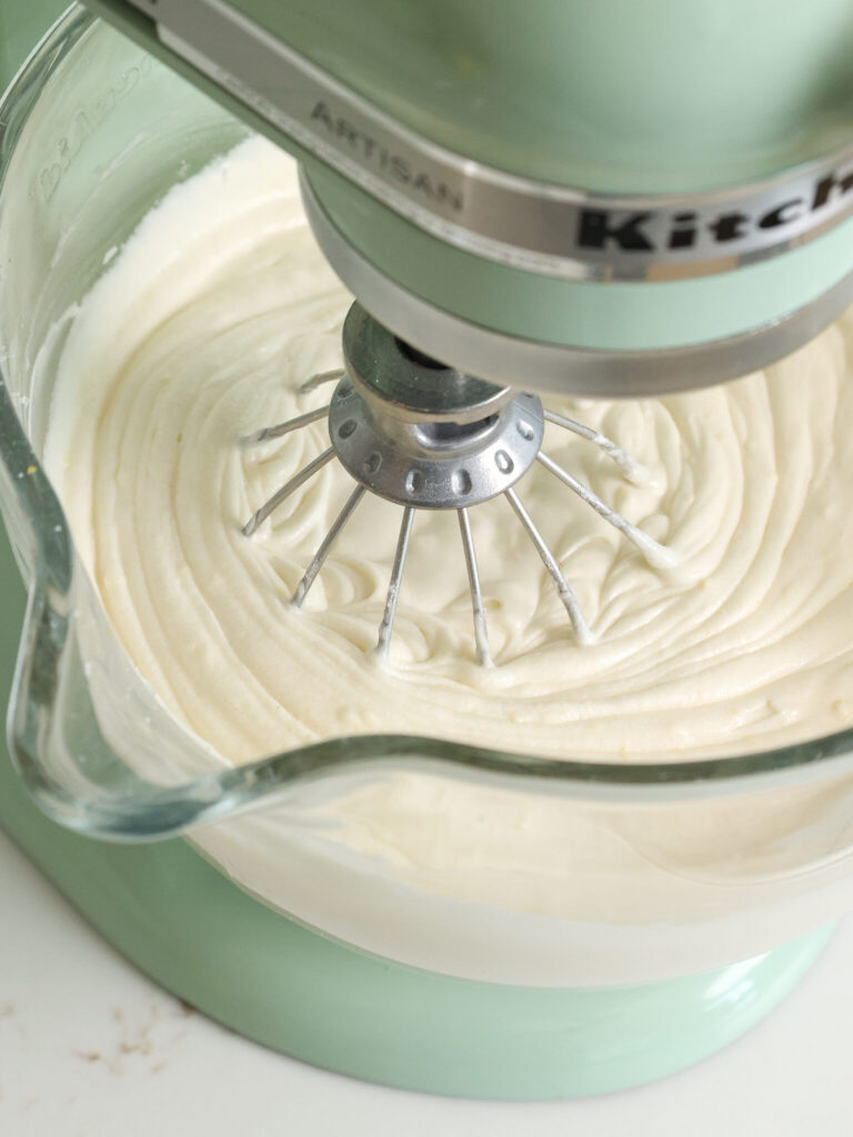 image of fluffy vanilla cake batter that's being made in a stand mixer