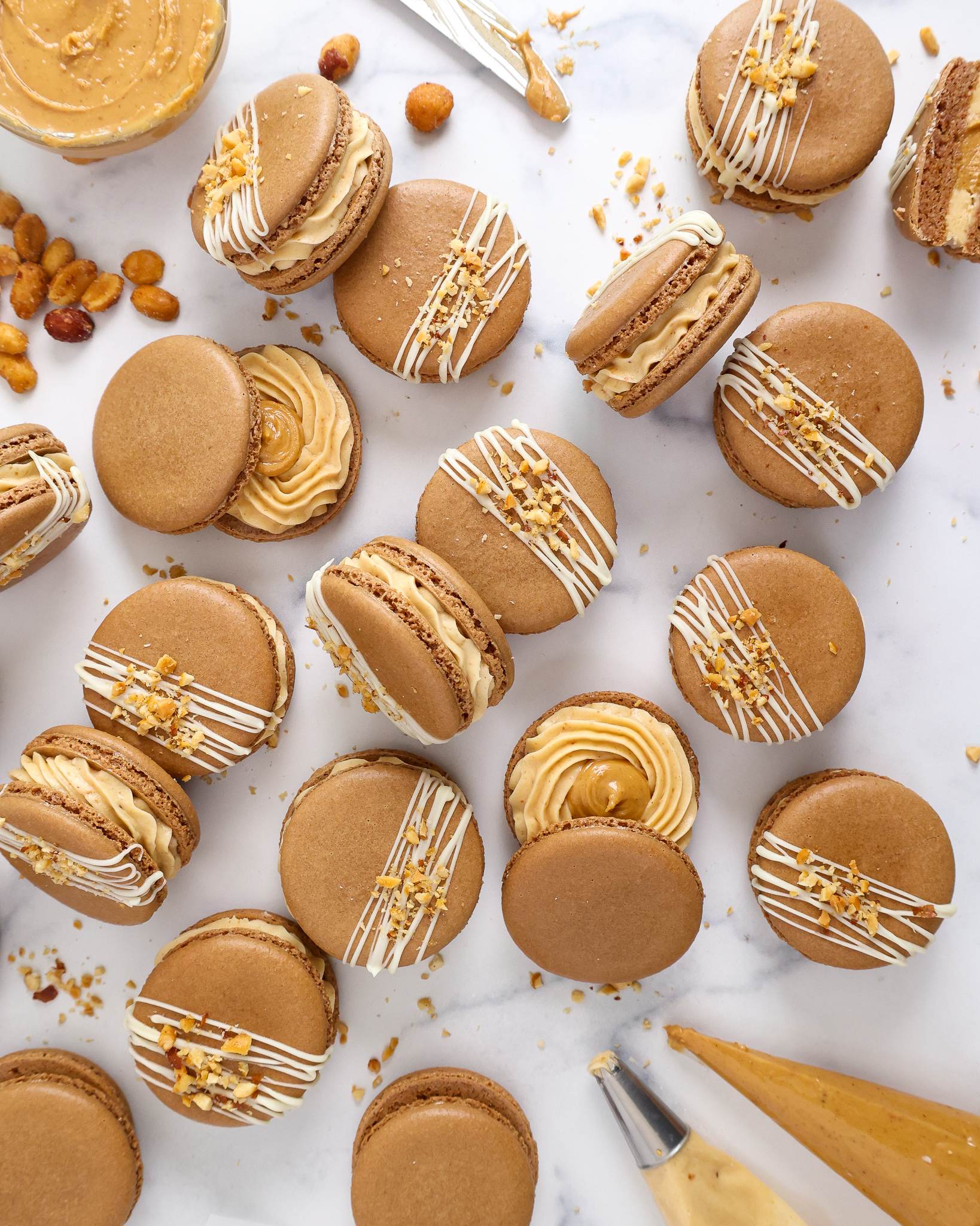 https://chelsweets.com/wp-content/uploads/2022/06/overhead-shot-of-PB-macarons-vert-further-out.jpg