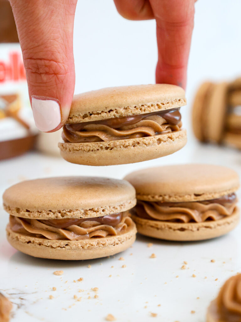 image of nutella macarons stacked on each other