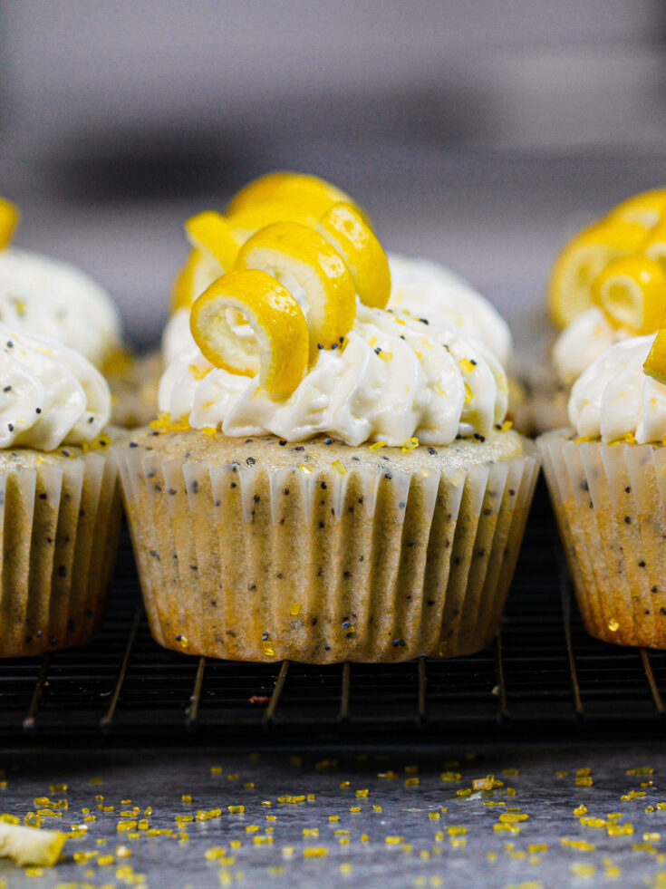 image of lemon poppyseed cupcakes frosted and ready to be served