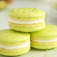 image of lime macarons stacked on top of each other