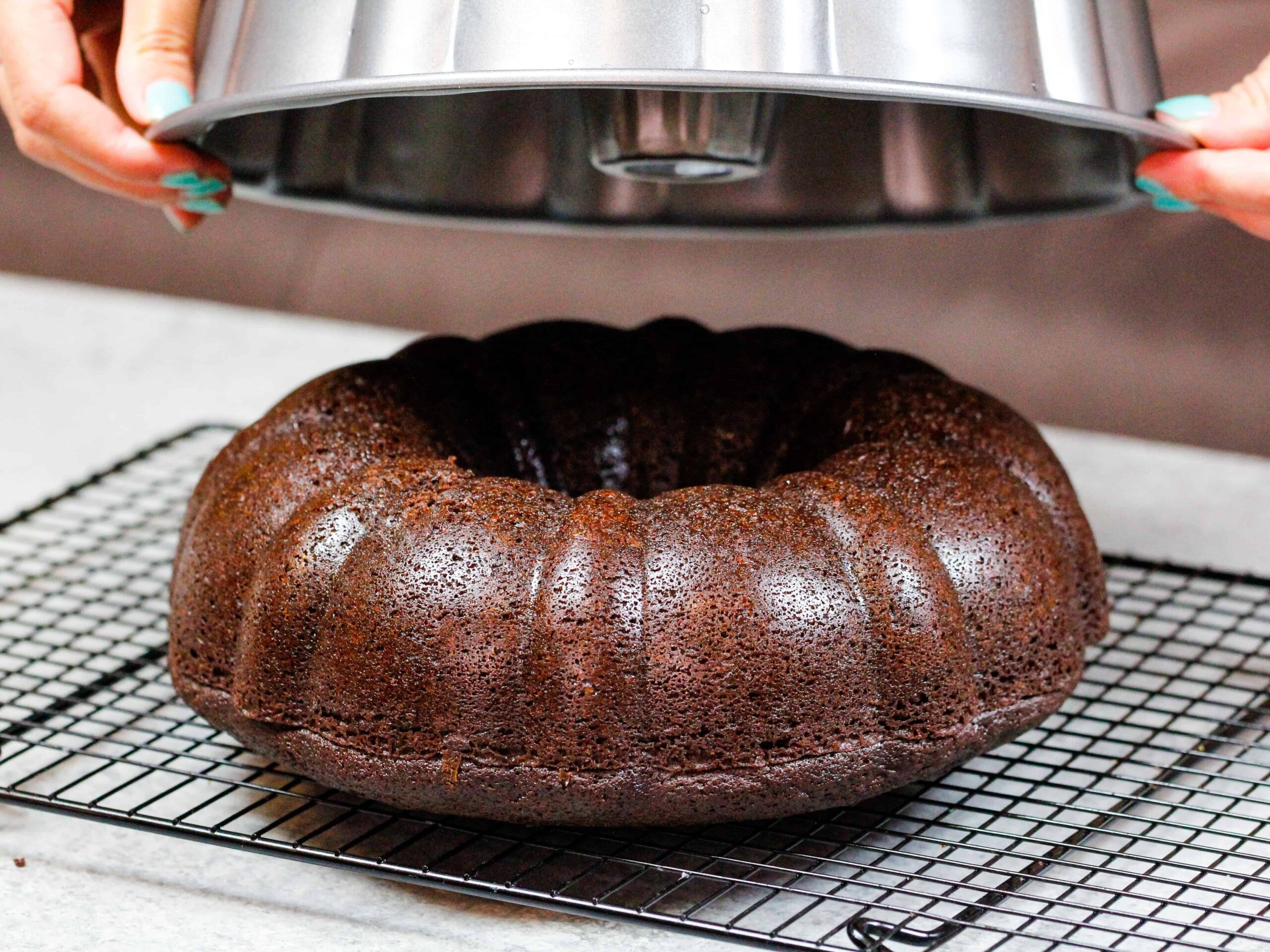 image of a bundt cake easily releasing from a bundt pan that was properly greased
