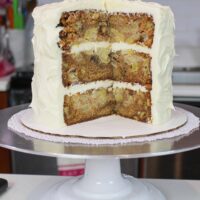 image of frosted old school apple layer cake, frosted with cream cheese frosting