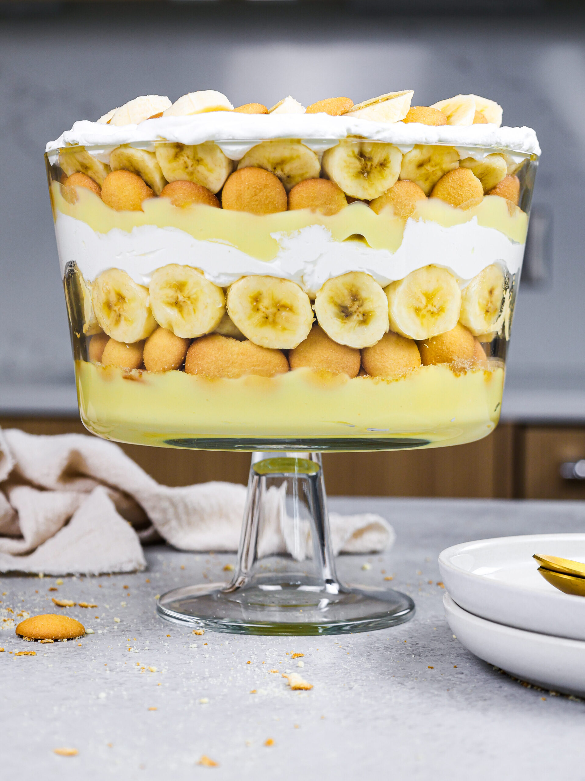 image of banana pudding trifle that's been layered and is ready to be eaten that's shared as part of a no bake dessert round up