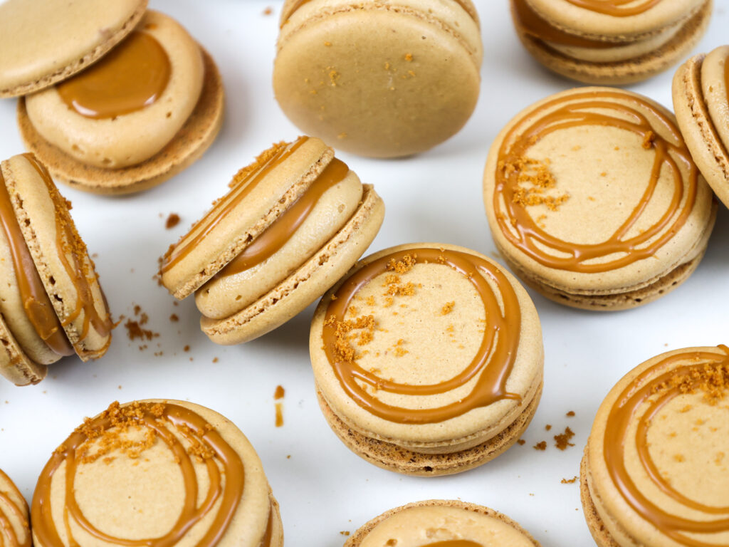 image of biscoff macarons that have been filled with biscoff buttercream and cookie butter