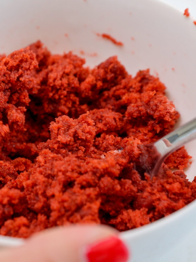 image of red velvet cake pop batter that's been made using red velvet cake pops and frosting