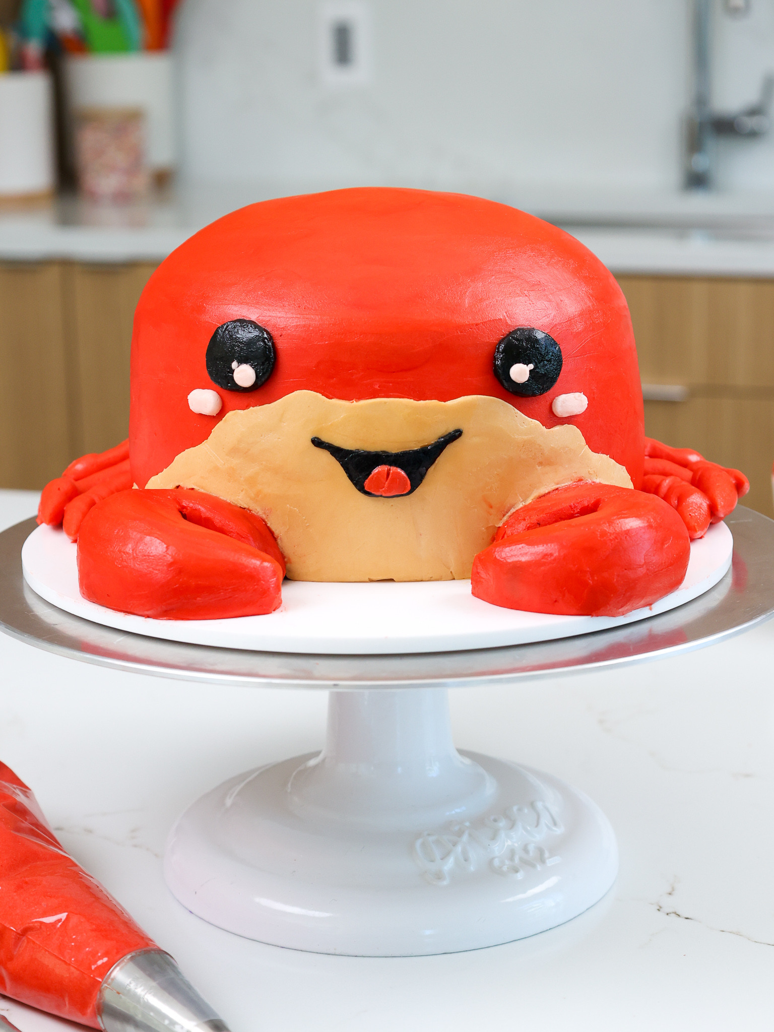 image of an adorable crab birthday cake made with buttercream frosting