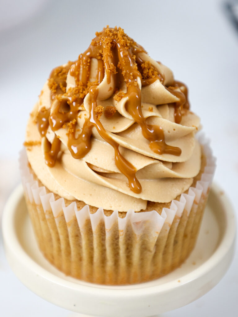 image of a cupcake that's been frosted with peanut butter cream cheese frosting