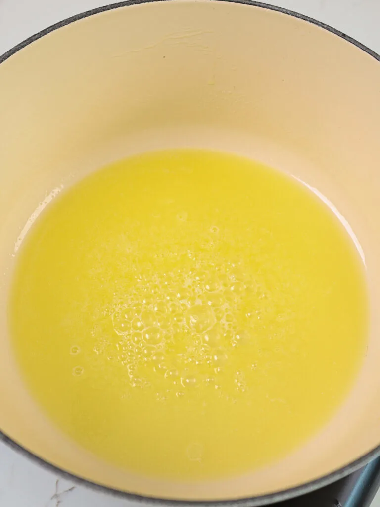image of butter that's been melted in a dutch oven