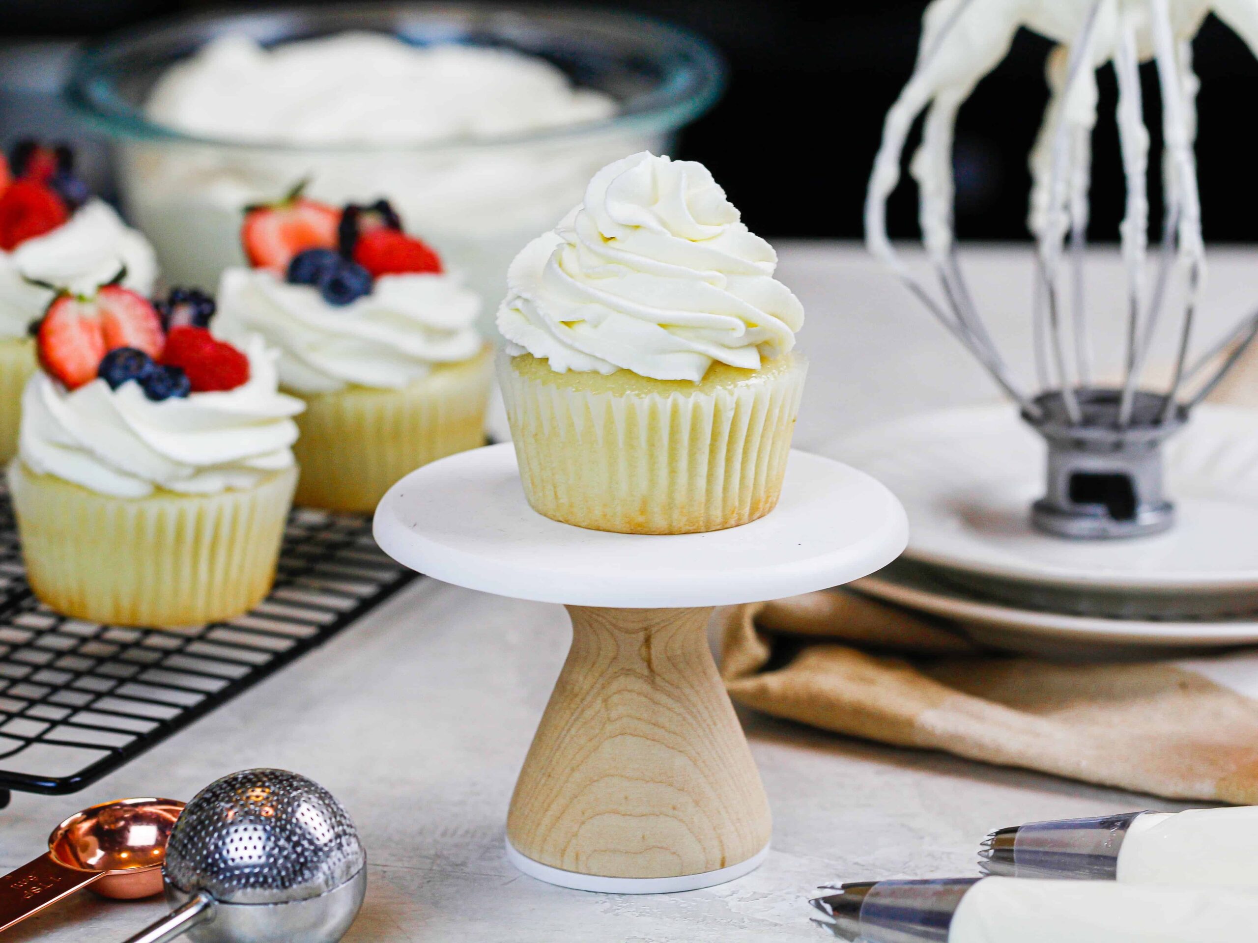 image of cupcake frosted with whipped cream frosting with mascarpone cheese