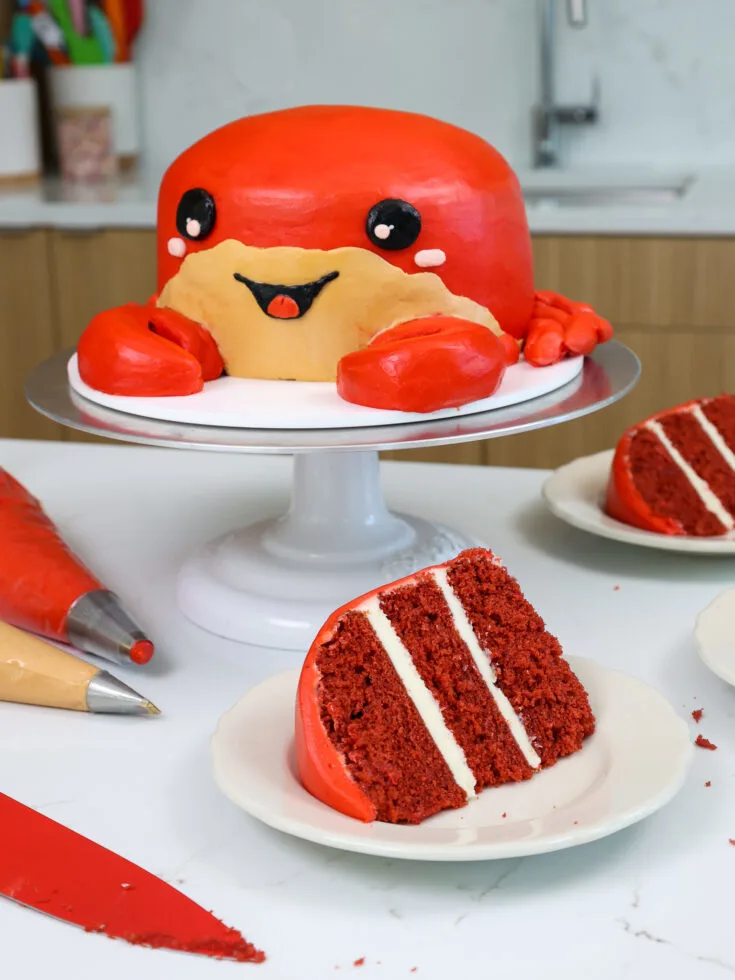 image of a cute crab birthday cake made with buttercream and red velvet cake layers