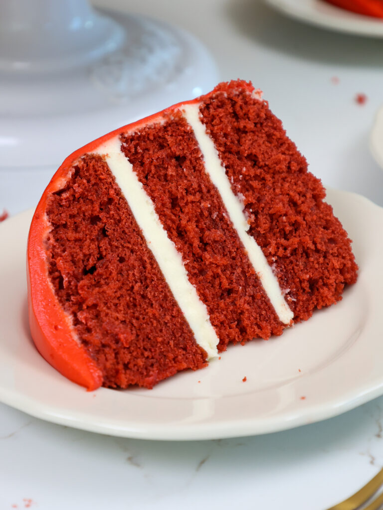 image of a slice of red velvet cake on a plate
