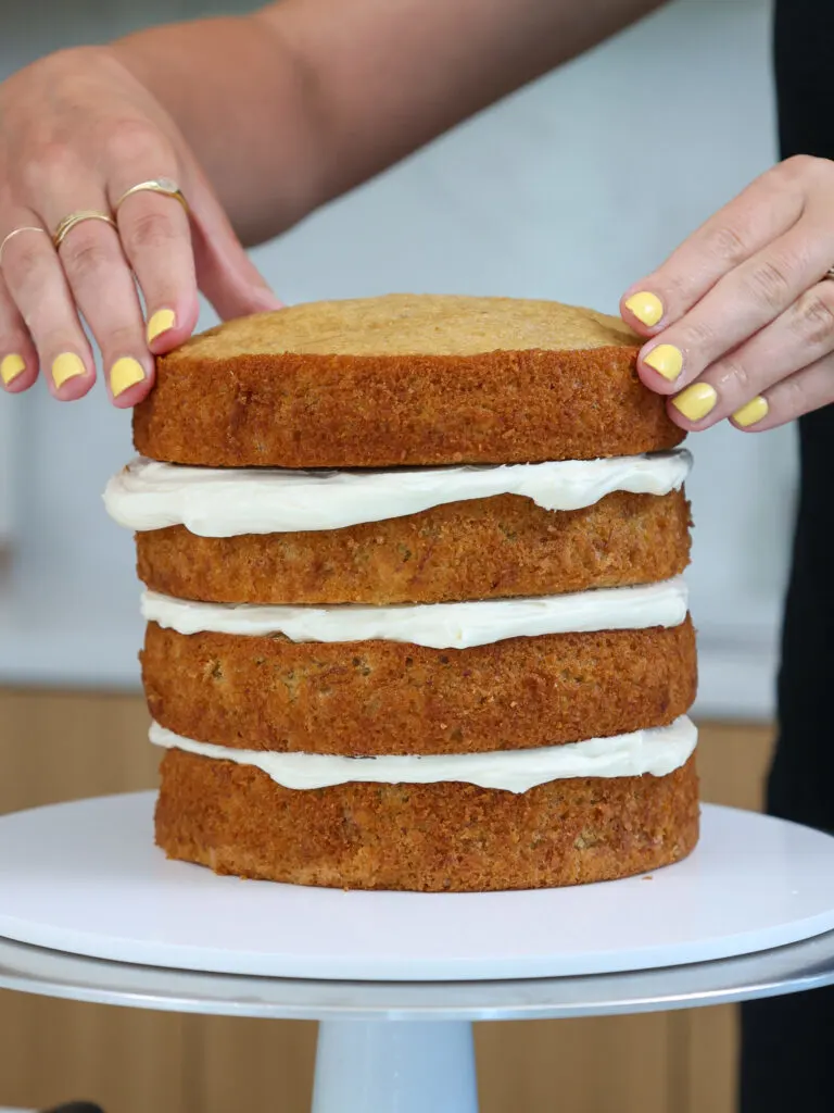 image of 6-inch banana cake layers that have been stacked and filled with buttercream frosting