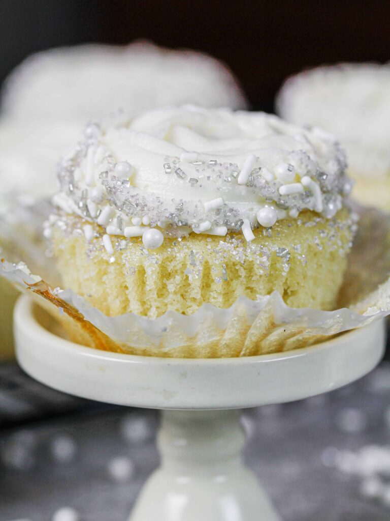 image of an almond cupcake frosted with almond buttercream