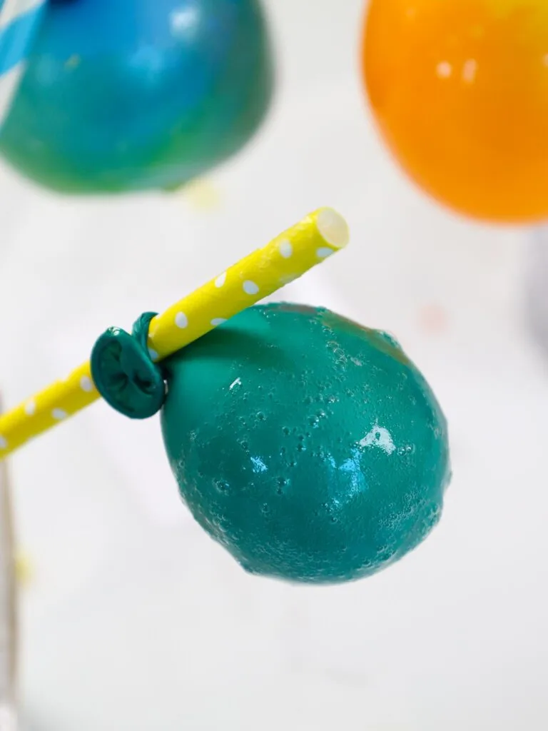 image of a bubbly, cloudy gelatin balloon that was incorrectly made with bubbly gelatin