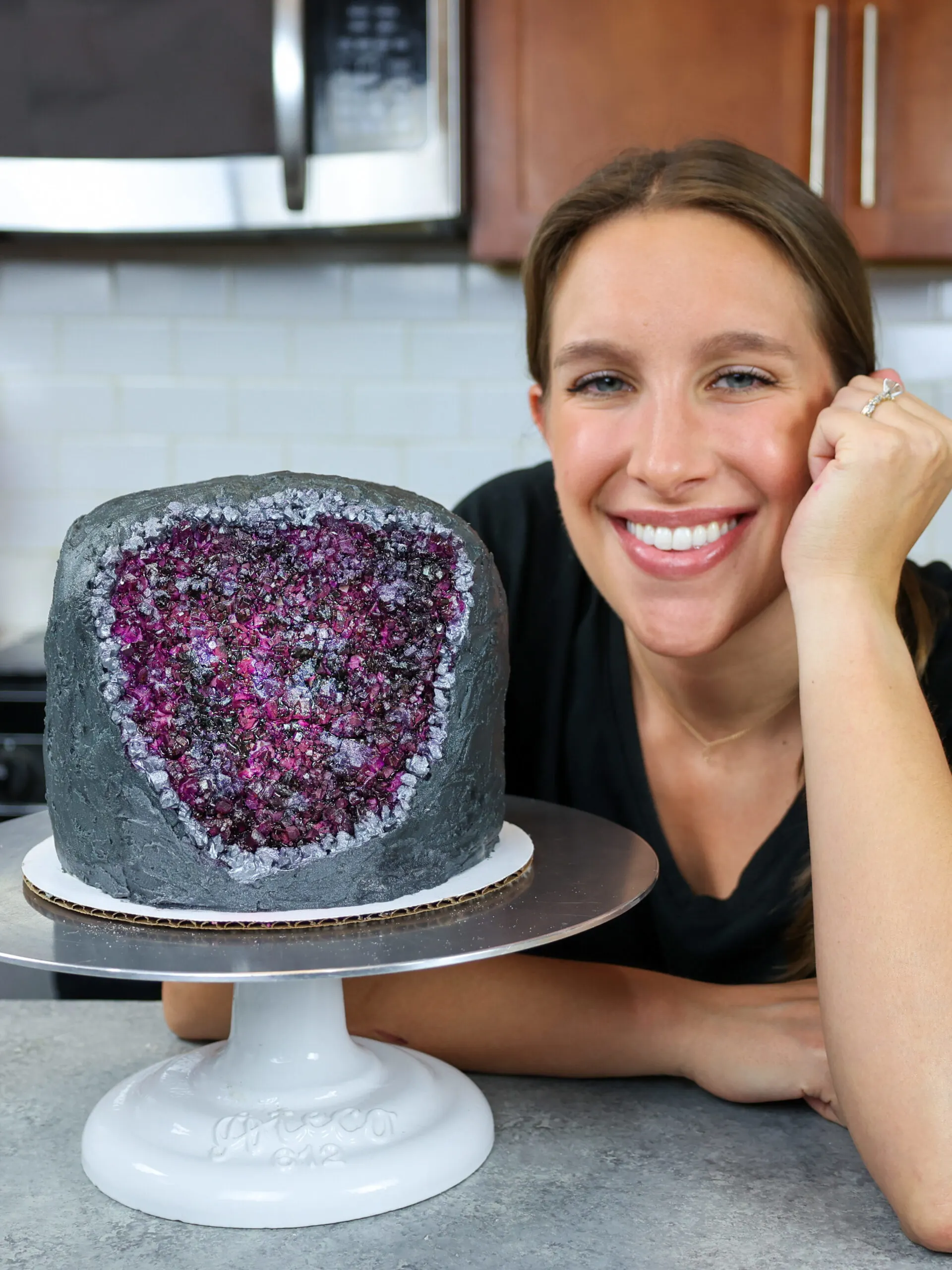 image of chelsey white of chelsweets with her amethyst geode cake