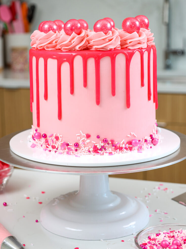 image of a bubblegum cake that's been made with bubblegum cake layers and pink bubblegum frosting