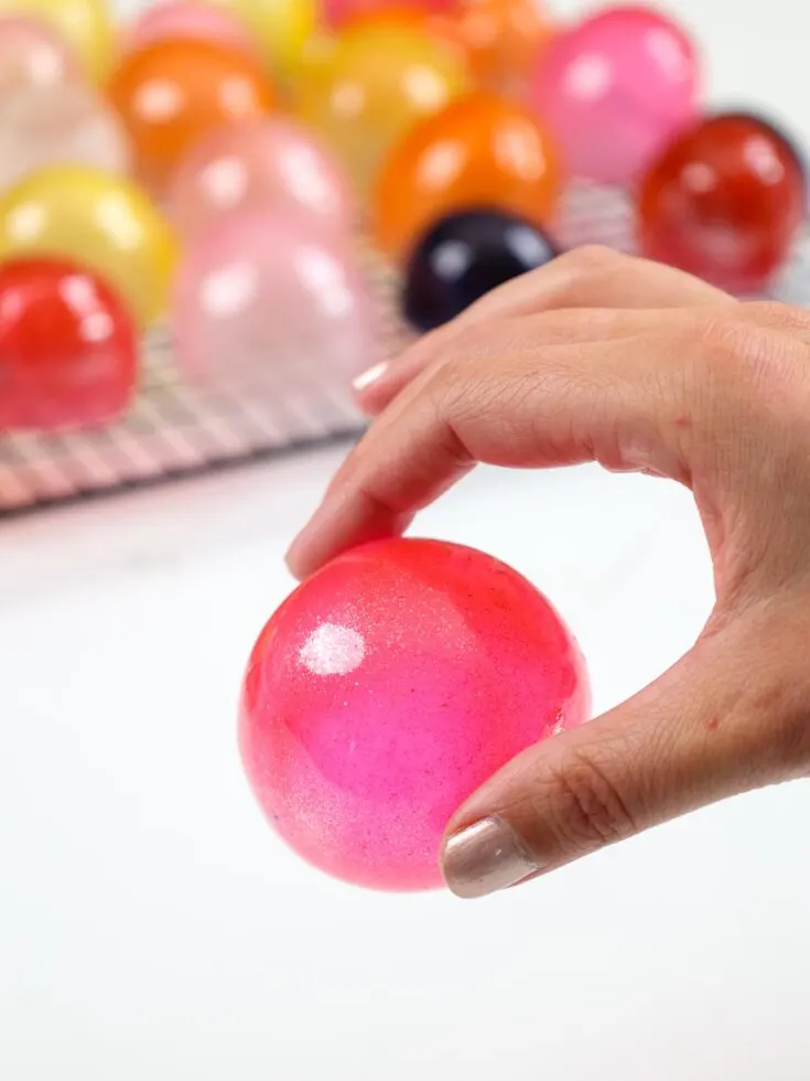 image of a pink gelatin bubble that's been made with small balloons