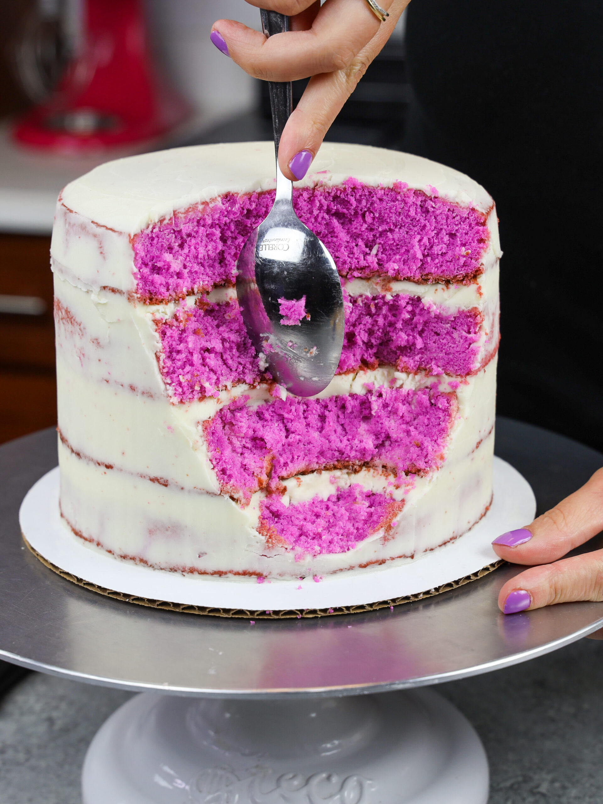 image of a cake being cut into to make a geode cake