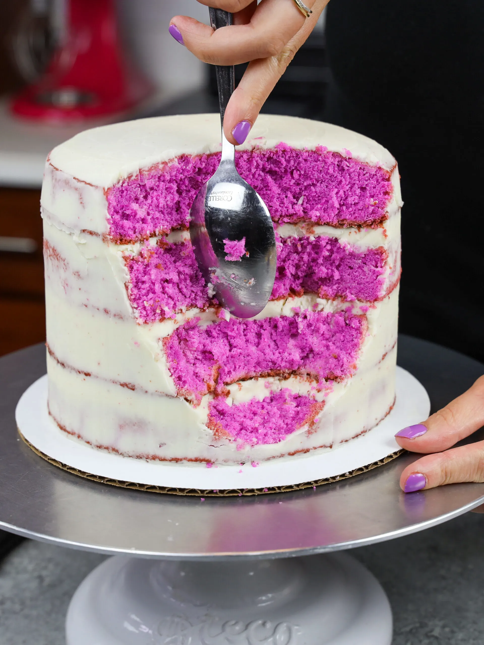 image of a cake being cut into to make a geode cake