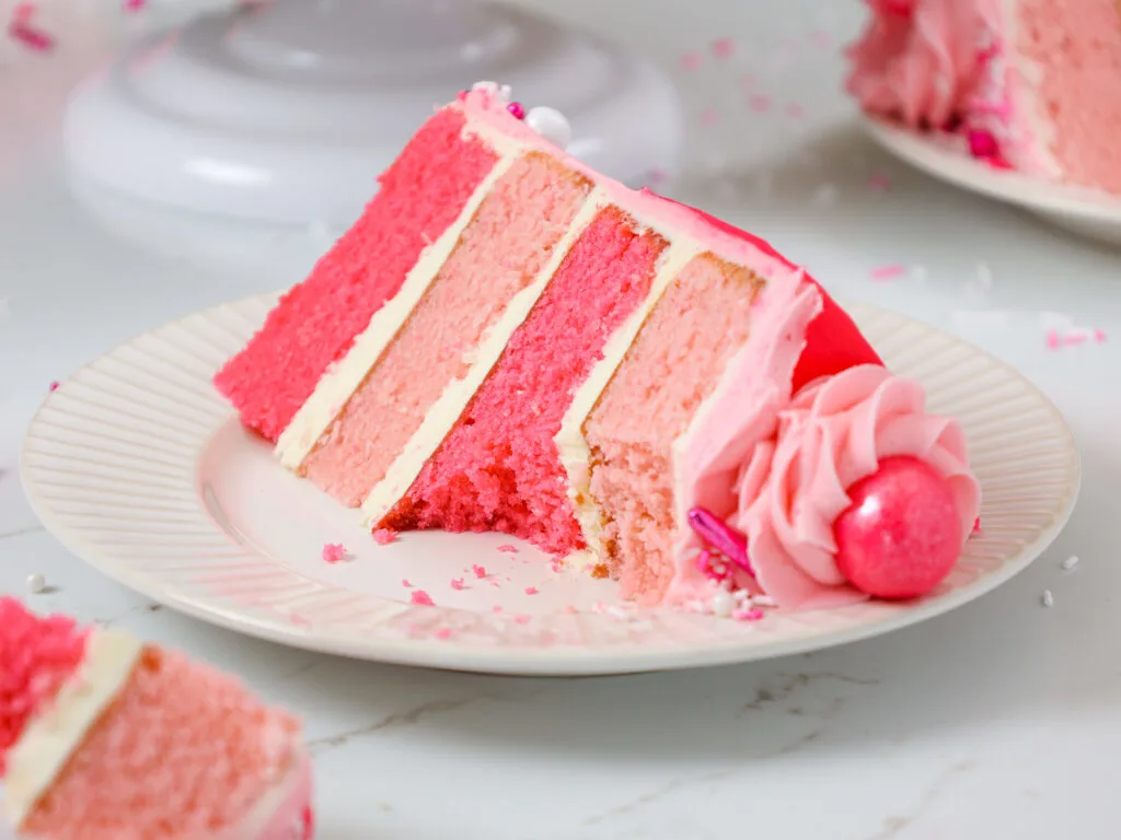 image of a bubblegum cake slice on a plate