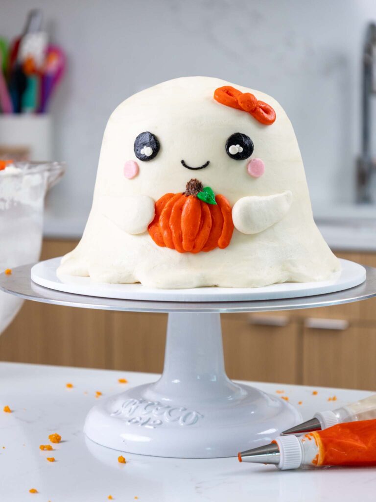 image of a cute ghost cake that's been frosted with buttercream frosting