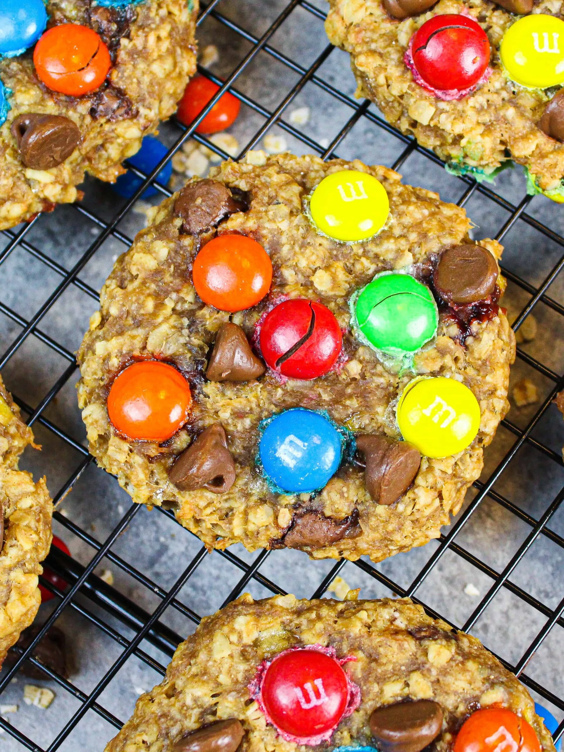 image of gluten free monster cookies cooling on a wire rack