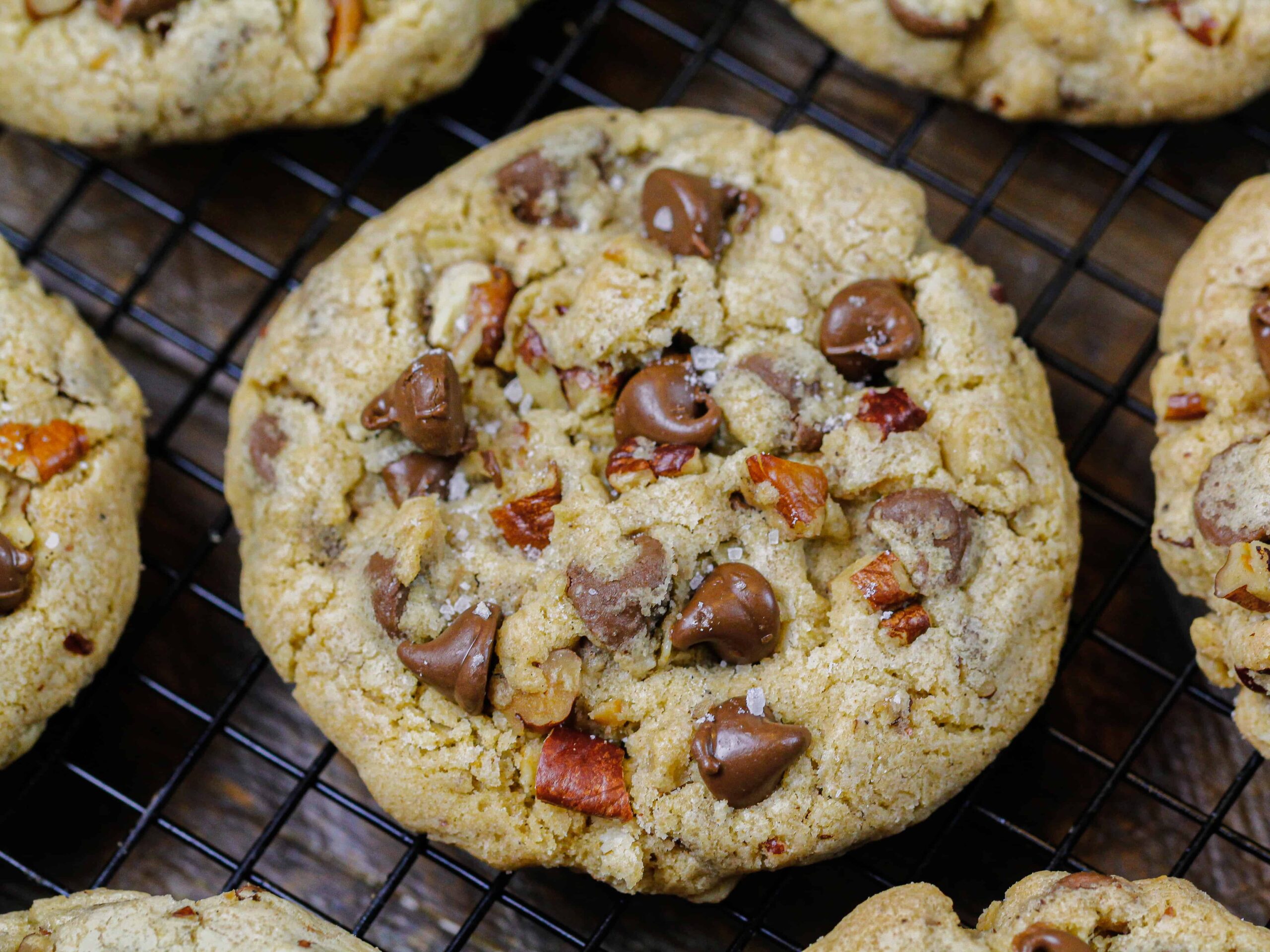 image of walnut chocolate chip cookie recipe cooling on a wire rack
