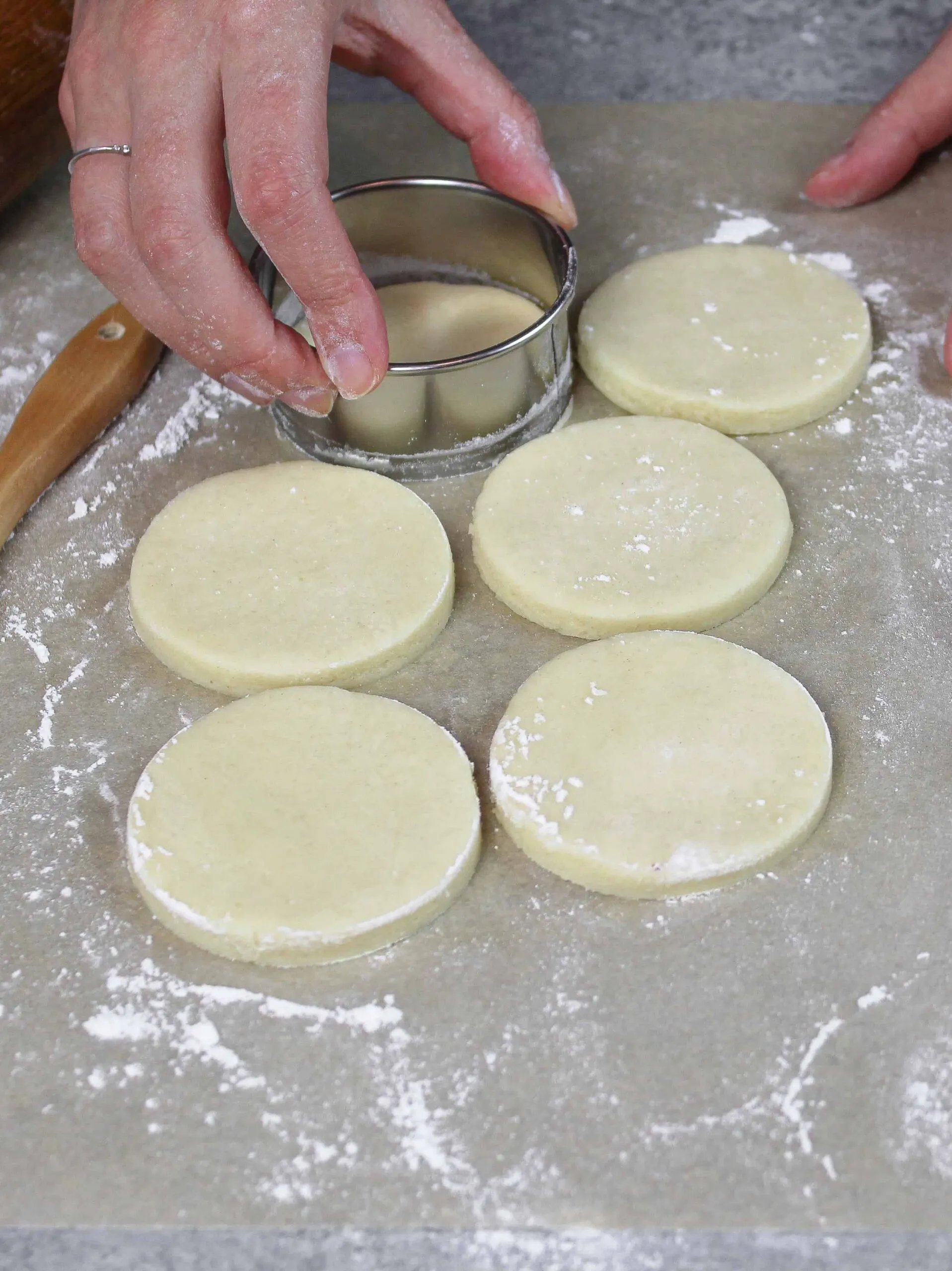 image of sugar cookies with cream cheese being cut out