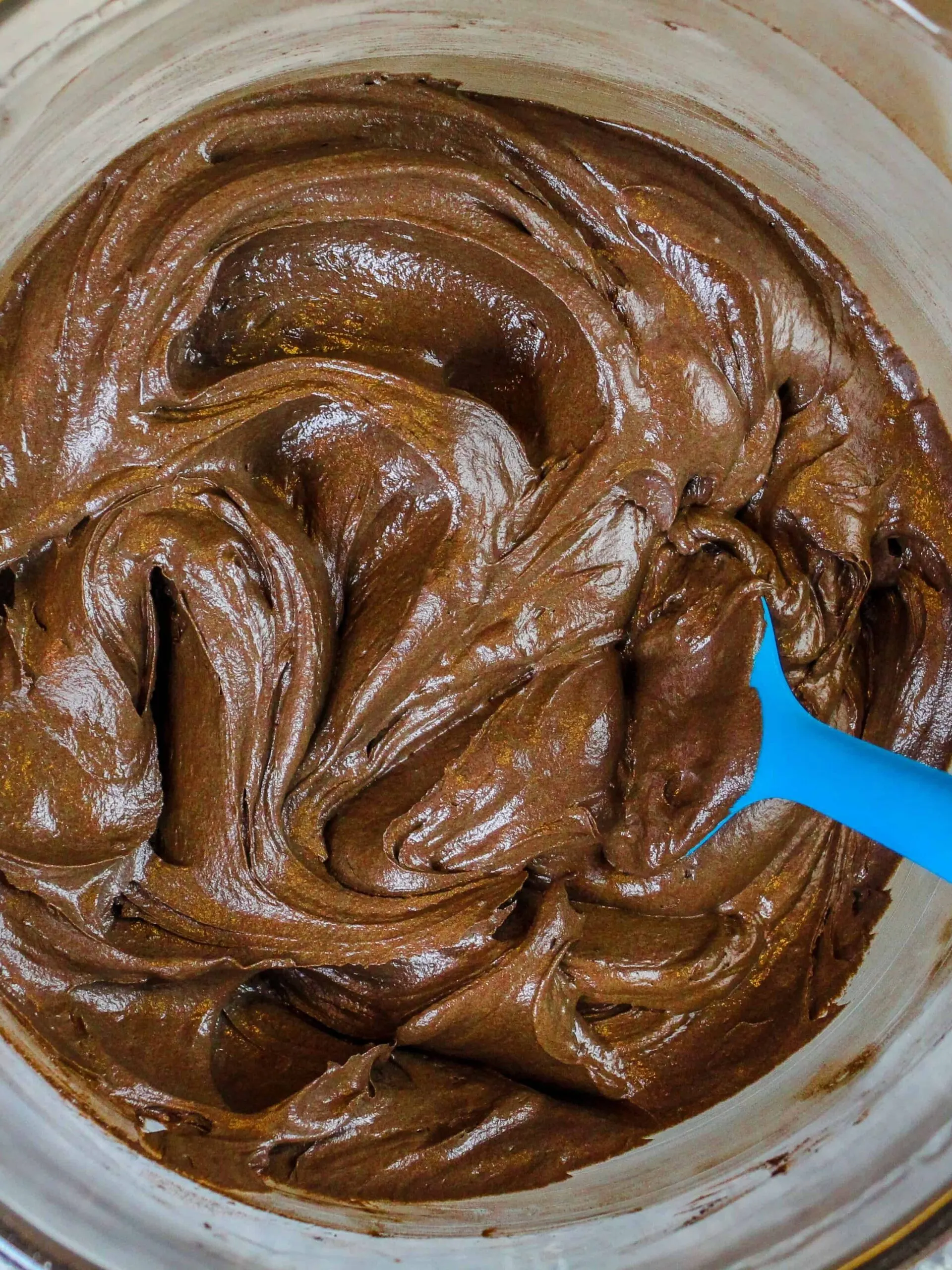 image of dark chocolate orange buttercream frosting in a bowl