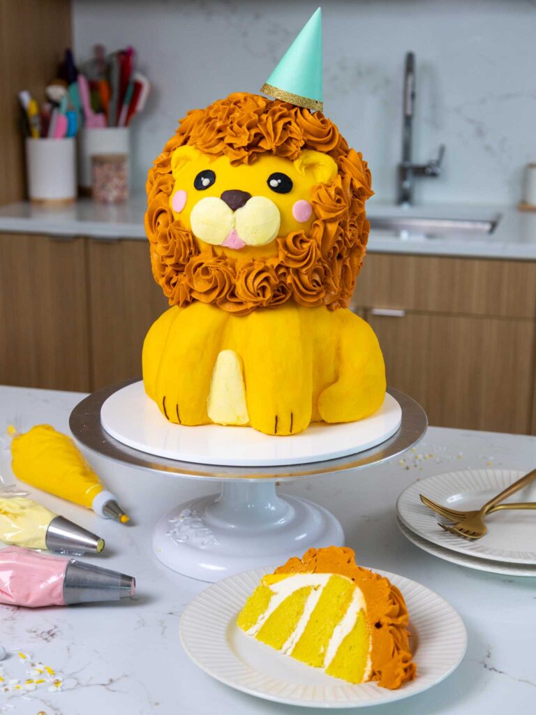 image of a cute buttercream lion cake made with vanilla cake layers