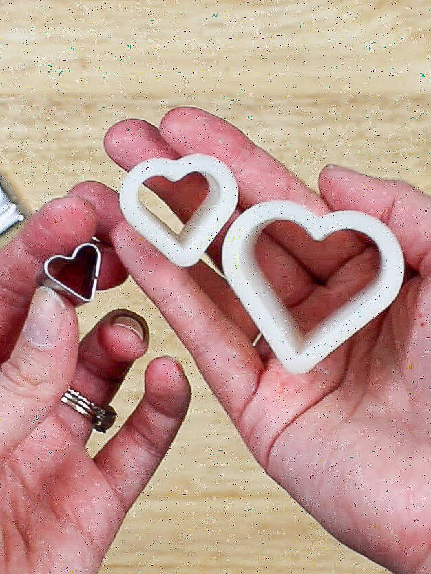 image of three heart shaped cookie cutters