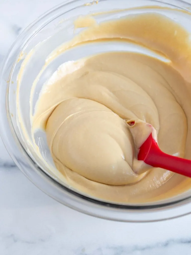image of smooth biscoff cheesecake batter that's been mixed on a low speed to make it nice and smooth