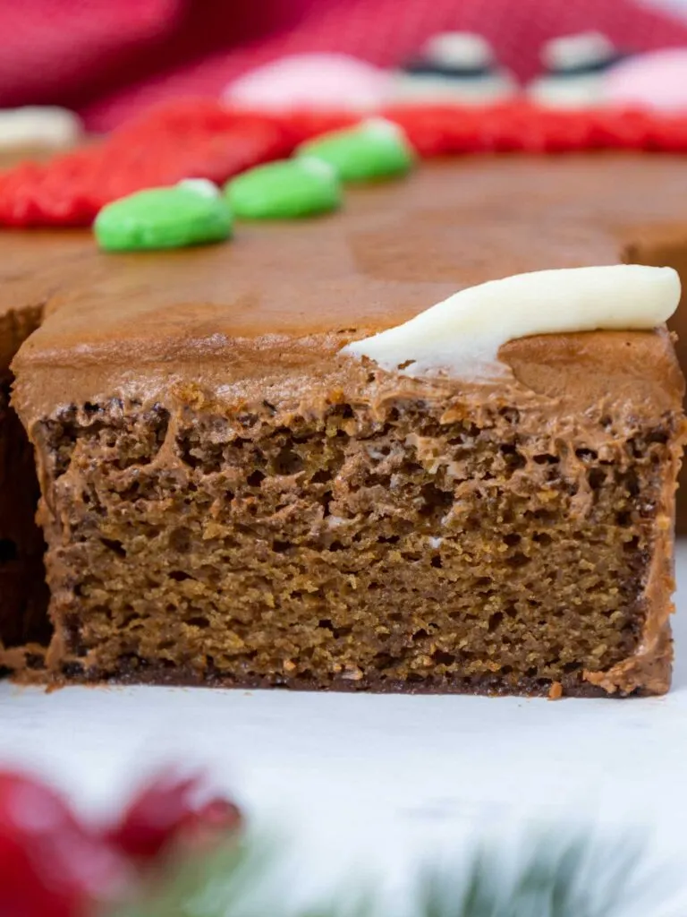image of a gingerbread sheet cake that's been cut into to show how tender and moist it is