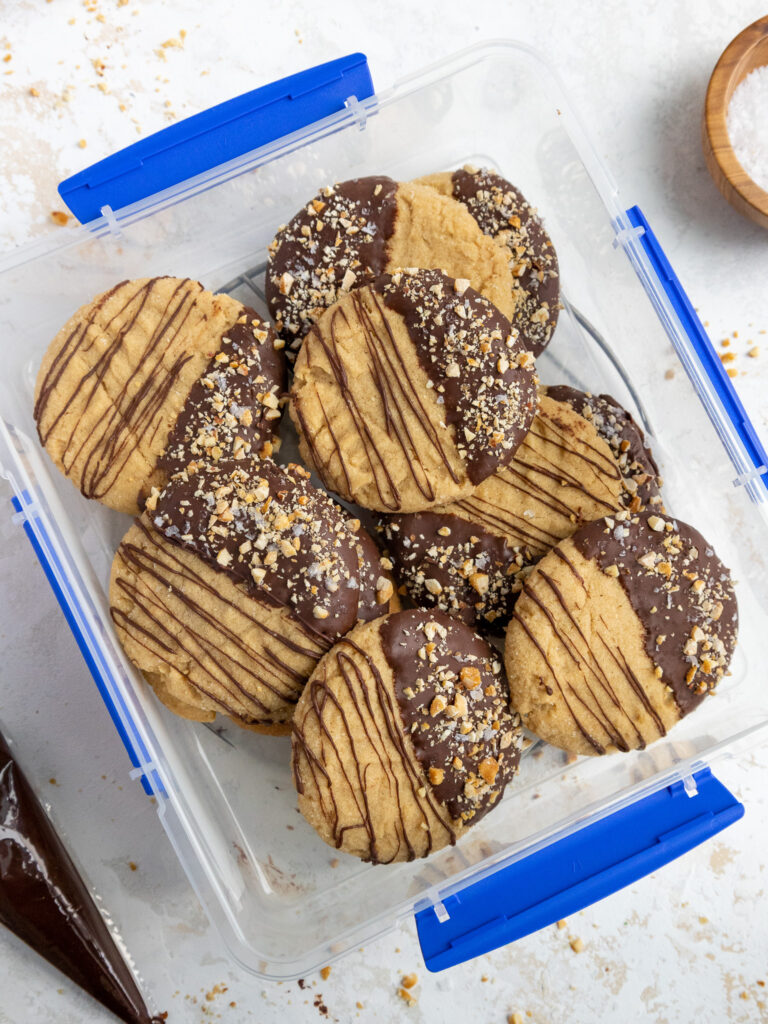 image of peanut butter cookies that have been made in advance and stored in an airtight container to keep them fresh