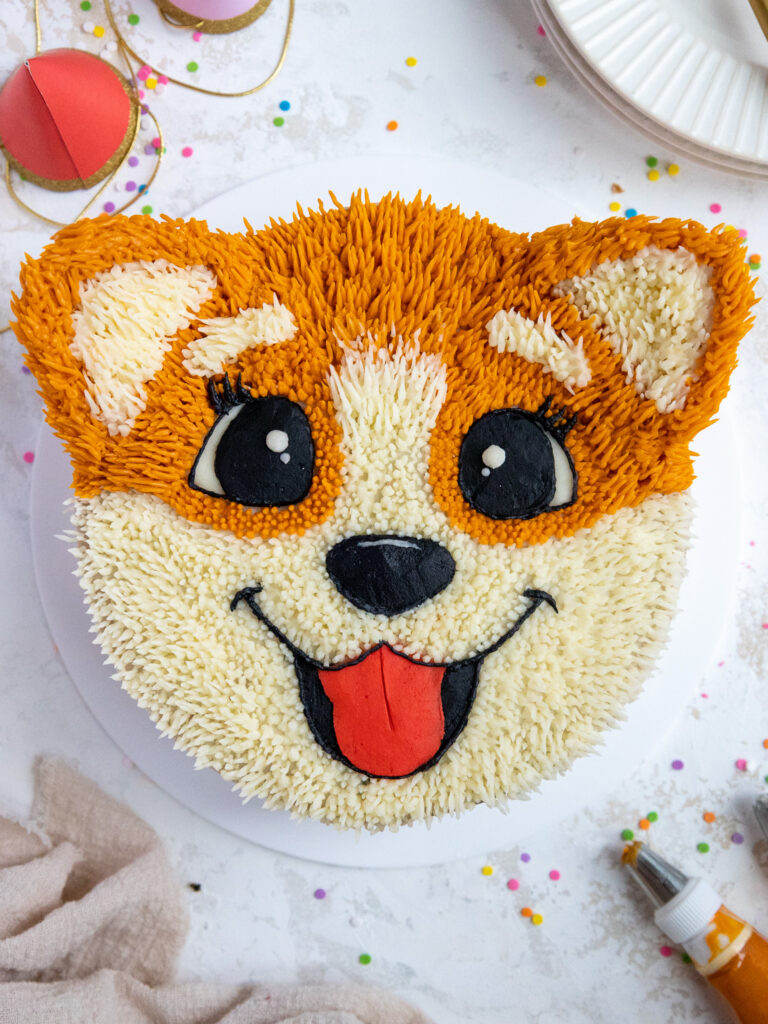 image of a cute corgi cake that's been decorated with buttercream frosting