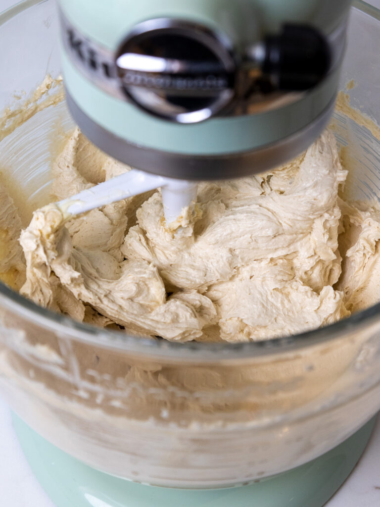 image of brown sugar and butter being beaten together to make brown sugar buttercream