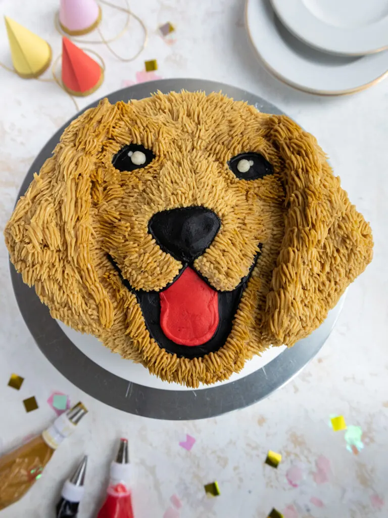 image of a cute buttercream golden retriever cake