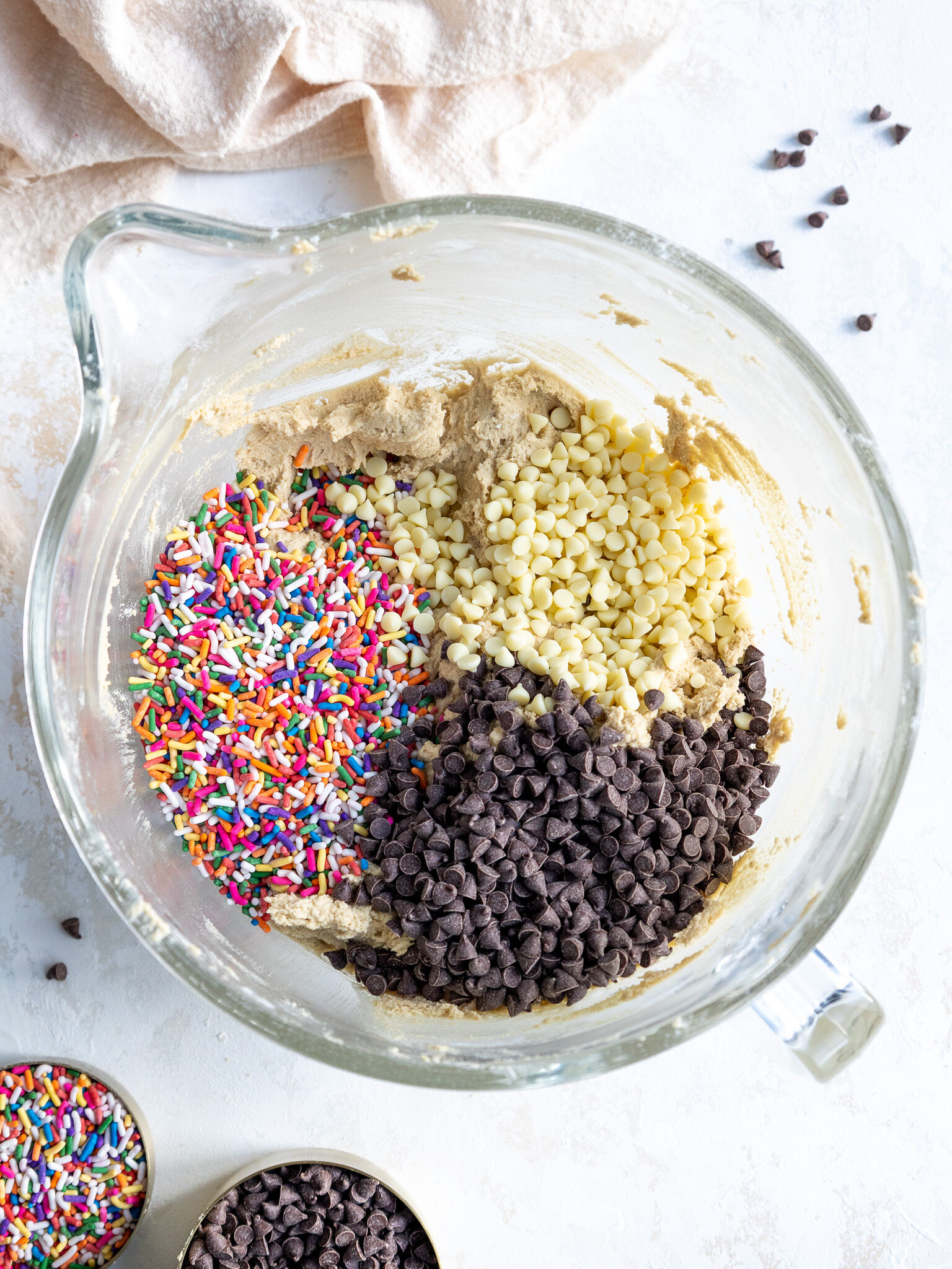image of edible cookie dough being made with mini chocolate chips and sprinkles