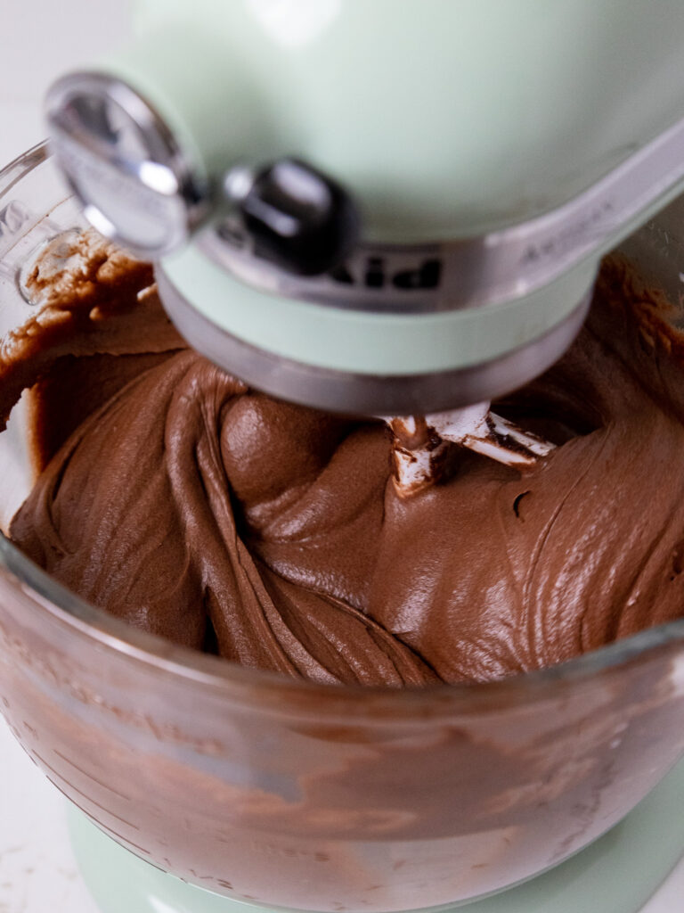 image of chocolate buttermilk cake batter being mixed in a KitchenAid stand mixer
